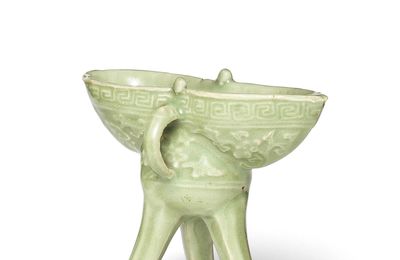 A rare small archaistic Longquan celadon tripod vessel, jue, 15th century