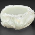 A well-carved white jade peah-form brush washer, Qianlong period (1736-1795)