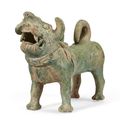A green glazed pottery figure of a dog, Han dynasty (206 BC-AD 220)