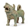 A green glazed pottery figure of a dog, Han dynasty (206 BC-AD 220)