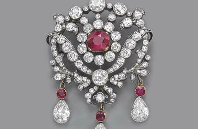 An antique ruby and diamond brooch