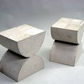 A pair of Modernist parchment and wrought-iron stools after a design by Constantin Brancusi, second half 20th century