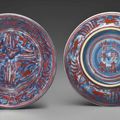 A very rare pair of small iron-red decorated blue and white dishes, Jiajing iron-red six-character marks within double-circles a