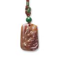 Red jadeite "Tiger" pendant