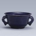 An Aubergine-Glazed Handled Cup, Qing Dynasty, Kangxi Period (1662-1722)