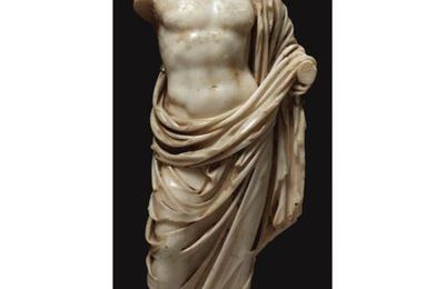 A Marble Torso of a God or Hero, Roman Imperial, circa 2nd Century A.D.