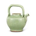 A Longquan celadon carved 'floral' wine ewer, Ming dynasty (1368-1644)