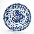 A rare and important imperial blue and white 'dragon' dish, Qianlong six-character seal mark and of the period (1736-1795)