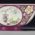 A famille rose ruby-ground 'medallion' bowl, Qianlong seal mark in underglaze blue and of the period (1736-1795)