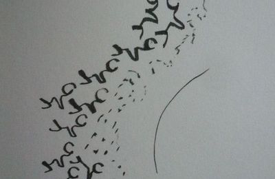 En calligraphie arabe