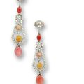 A pair of conch pearl and diamonds earrings