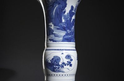 A good blue and white gu-shaped vase with a sea landscape, flowers and insects, Kangxi period (1662-1722)