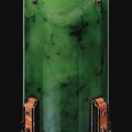 Nephrite, sapphire, coral and black enamel vase, Cartier, circa 1925.