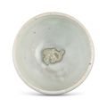 A moulded Yaozhou moon-white glazed 'fish' bowl, Northern Song-Jin dynasty