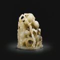 A greyish celadon jade ‘Longevity’ hat finial, Yuan dynasty
