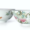 An extremely rare and superbly enamelled pair of Famille-Rose 'Peach' bowls, Marks and period of Yongzheng