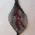 Pendentif en dentelle