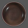 A copper red glazed deep dish, Daoguang six-character mark and of the period