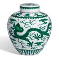 A green-enamelled 'dragon' jar, Qianlong six-character seal mark in underglaze blue and of the period (1736-1795)