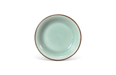 A small celadon-glazed dish, Qianlong mark and period (1736-1795)