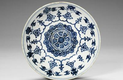 A blue and white 'Buddhist Emblems' shallow bowl, Jiajing six-character mark and of the period