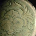 A very rare Yaozhou celadon 'Peony' box and cover with 'Floret' appliques, Northern Song – Jin dynasty