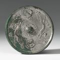 A bronze 'Spirits of the Four Directions' mirror, Tang Dynasty