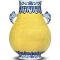 A fine and rare underglaze-blue-decorated, yellow-ground incised pear-shaped vase, Qianlong mark and period (1736-1795) 