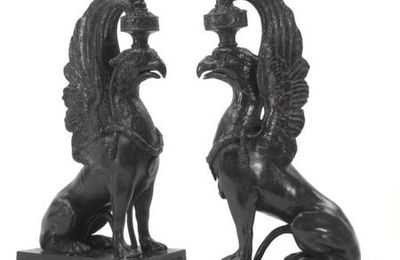 A pair of Wedgwood black basalt griffin candlesticks. Late 18th/early19th century
