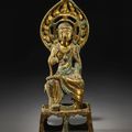 A gilt-bronze figure of a seated bodhisattva, Sui-Tang dynasty (581-906)