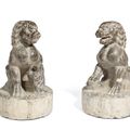 A pair of limestone guardian lions, Ming dynasty or earlier