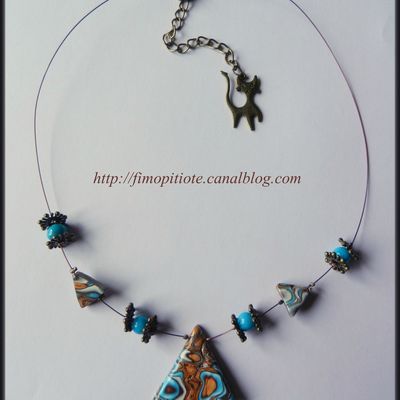 Collier et Boucles d'oreilles hidden magic en pâte fimo...