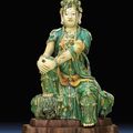 A rare Ming sancai glazed stoneware figure of Guanyin, Ming dynasty, 16th century