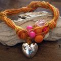 Collier ficelle rose-orange et coeur argenté