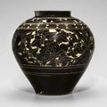 A large blackish-brown cut-glazed jar, Jin-Yuan dynasty, 13th-14th century