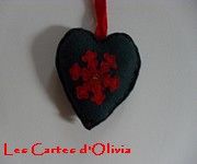 Coeur en feutrine verte 10X1O surpiqué de fil à