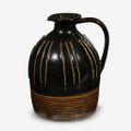 A Chinese 'Cizhou' black glazed ribbed ewer, Northern Song dynasty (960–1127)