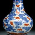 A blue and white and iron-red decorated bat and cloud vase, underglaze blue Guangxu mark and period (1875-1908)