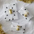 Papier cadeau : un motif bobines de fil pour les fans de couture (gratuit - à imprimer)