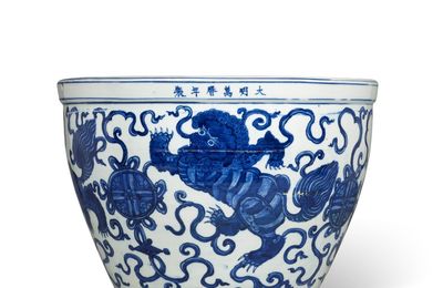 A blue and white 'Buddhist lions' basin, Wanli six-character mark in underglaze blue in a line and of the period (1573-1619)