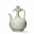 A carved Qingbai-glazed ‘Phoenix-head’ ewer, Song dynasty (970-1279)