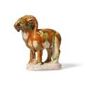 A rare small sancai-glazed pottery figure of a ram, Tang dynasty (AD 618-907)