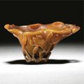 A rhinoceros horn 'Magnolia' libation cup, Qing dynasty, 18th century