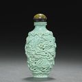 A molded and enameled porcelain 'dragon and phoenix' snuff bottle, Jiaqing mark and of the period