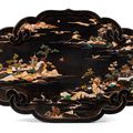 A hardstone-inlaid brown lacquer plaque, Qing dynasty, 19th century