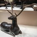 A lacquered wood figure of a deer, Warring States period, 4th century BC