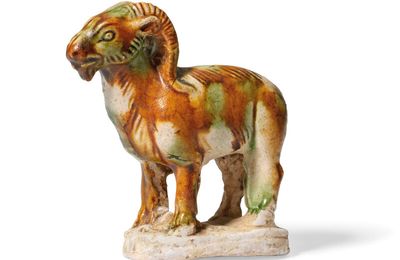 A rare small sancai-glazed pottery figure of a ram, Tang dynasty (AD 618-907)