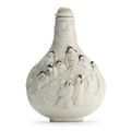 A molded porcelain snuff bottle, 1821-1850.