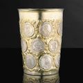 A German parcel-gilt silver coin beaker, Gottfried Schmidt, Leipzig, circa 1680