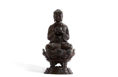A bronze figure of a Medicine Buddha, Liao dynasty